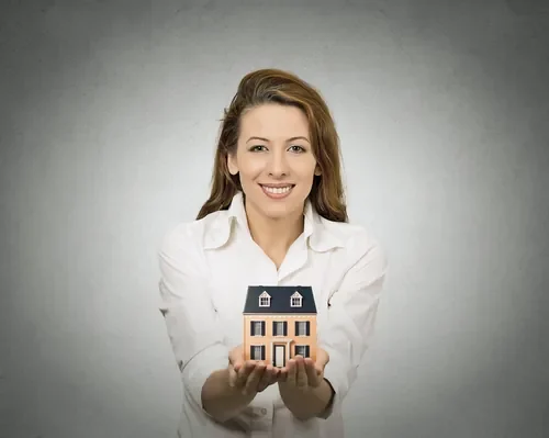 woman-holding-small-model-of-house