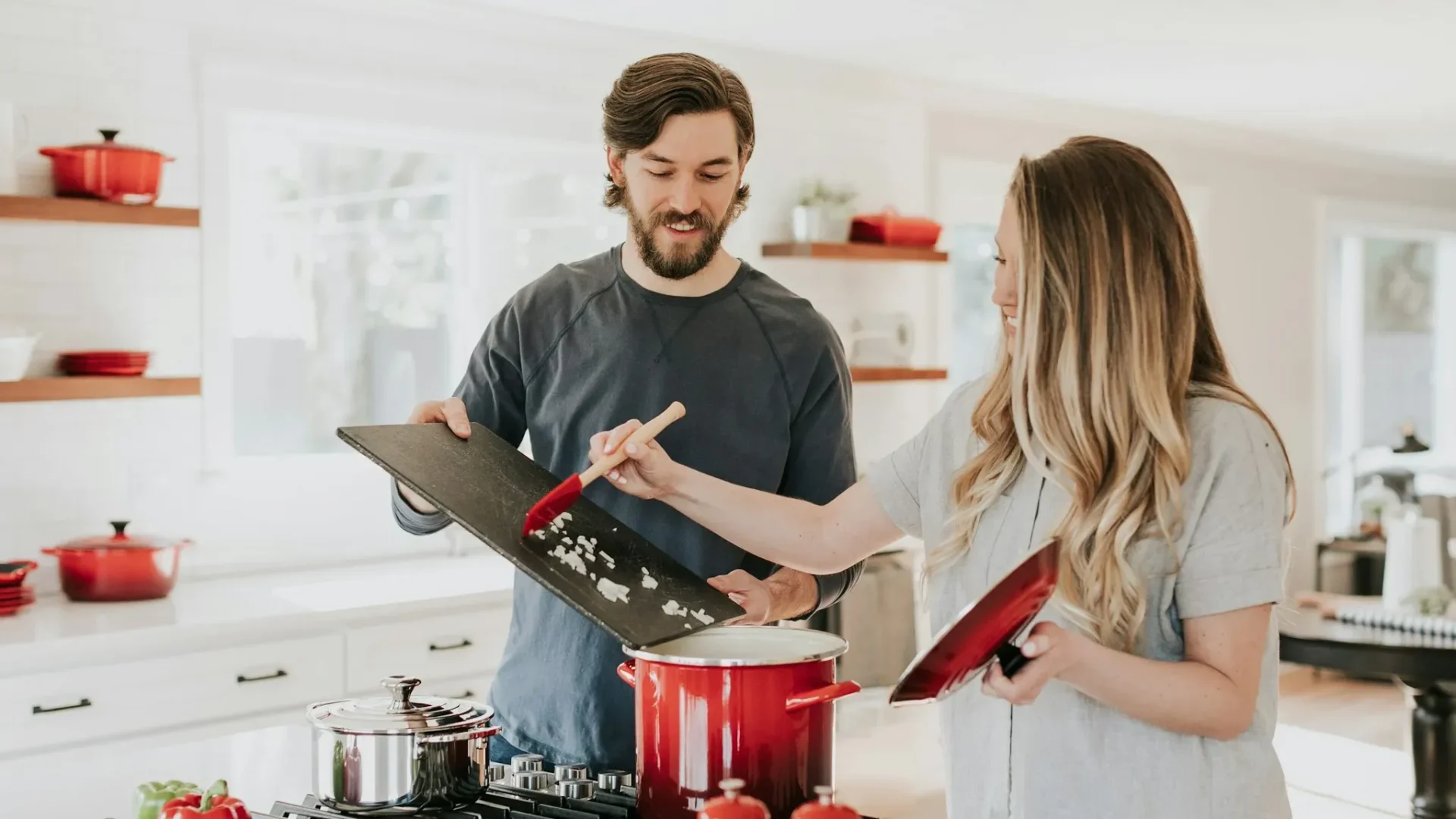 Family assistant organizing a household calendar while coordinating daily tasks for a busy family